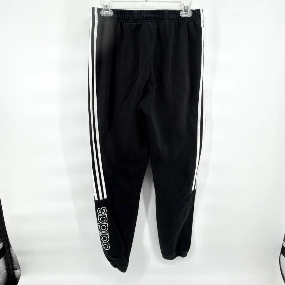 Adidas Men M Black Fleece Joggers Tapered Sweatpants 3 Stripe Spell Out GT9435